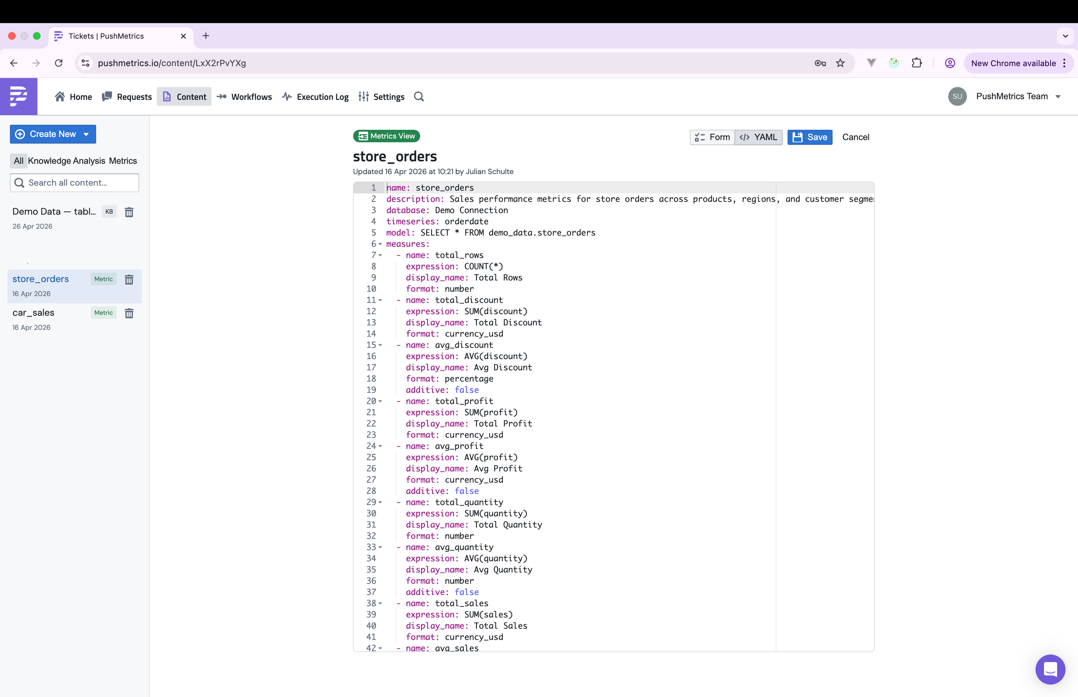 The YAML editor for a metrics view, showing the same definition with name, description, database, timeseries, model, and a list of measures with name, expression, display_name, format, and additive flag