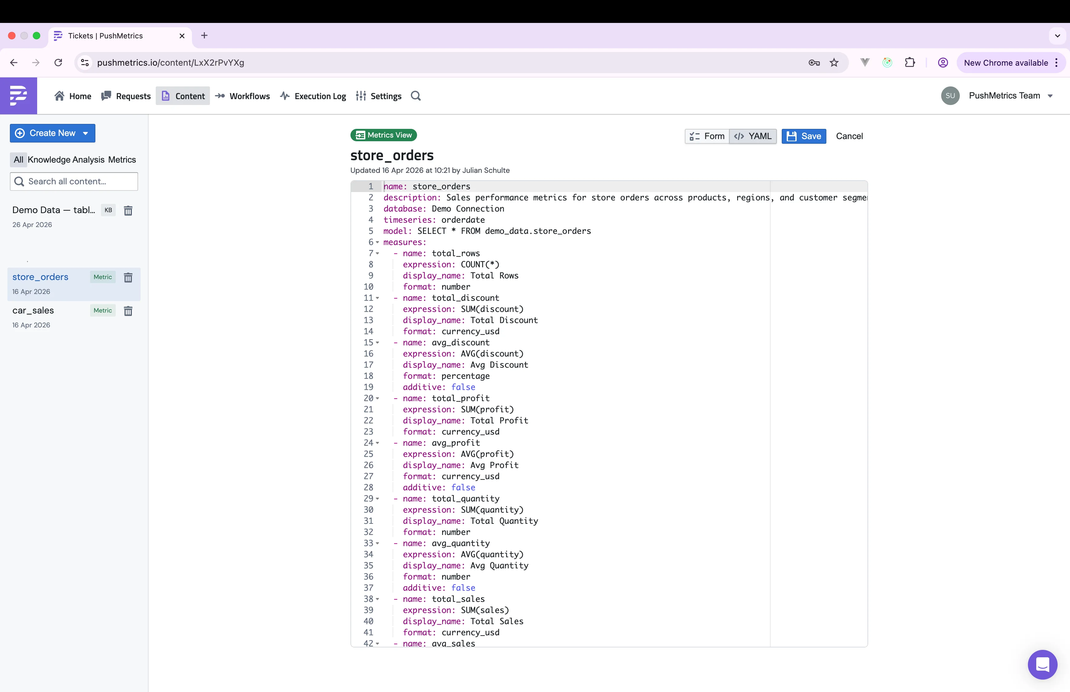 The YAML editor for a metrics view, showing the same definition with name, description, database, timeseries, model, and a list of measures with name, expression, display_name, format, and additive flag